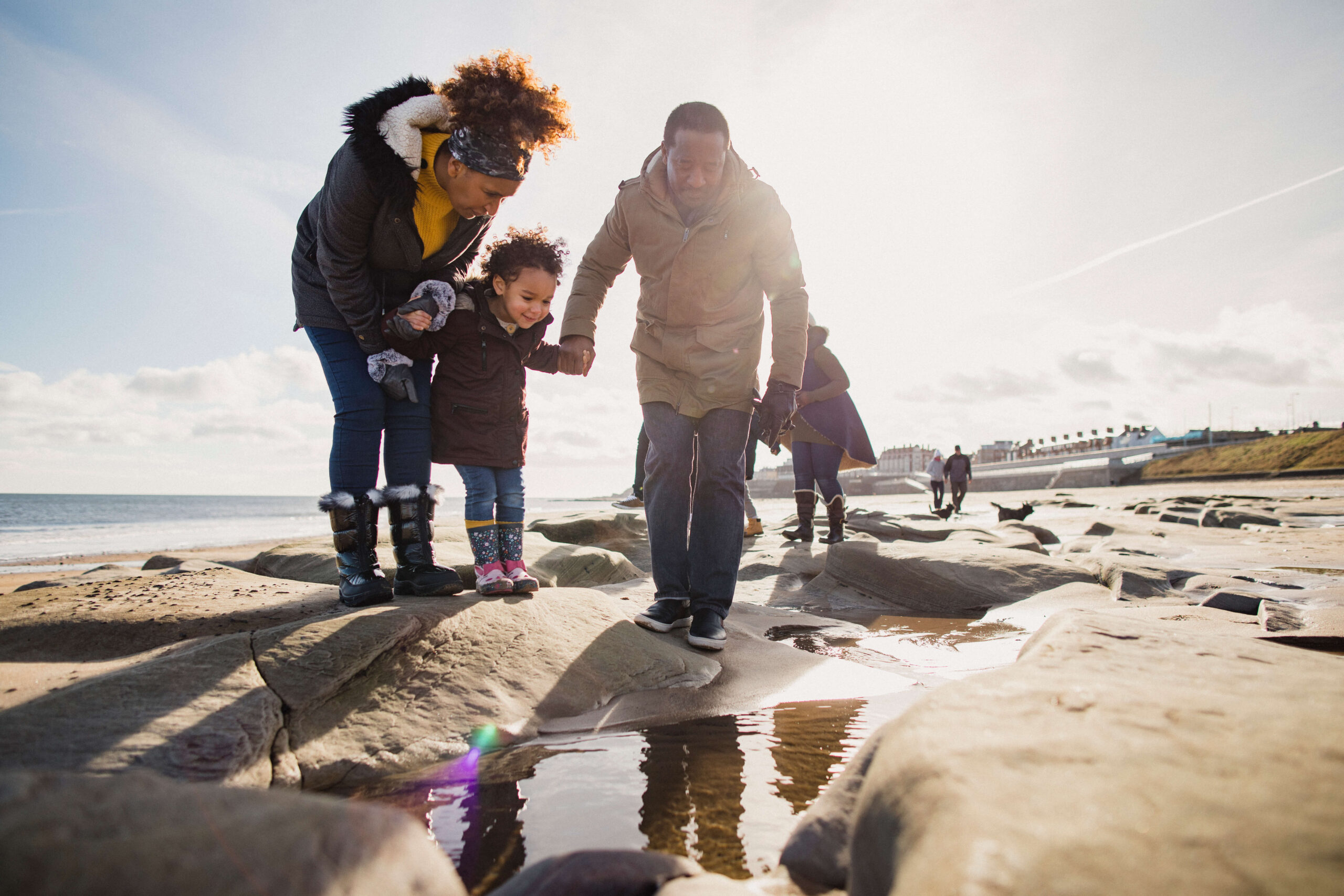 Family at rock pool