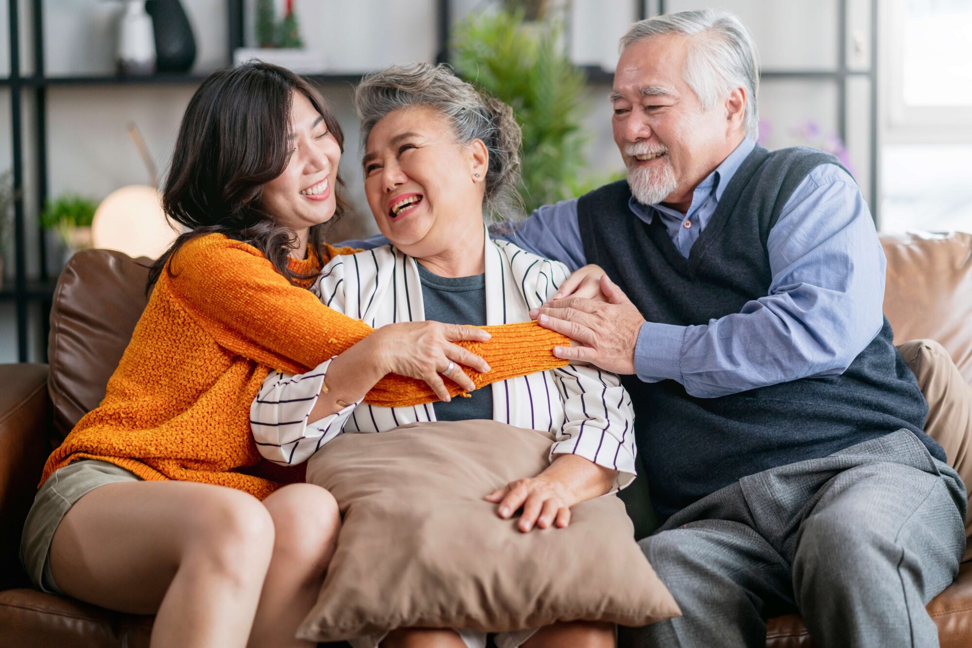 Asian grandaughter with grandparents