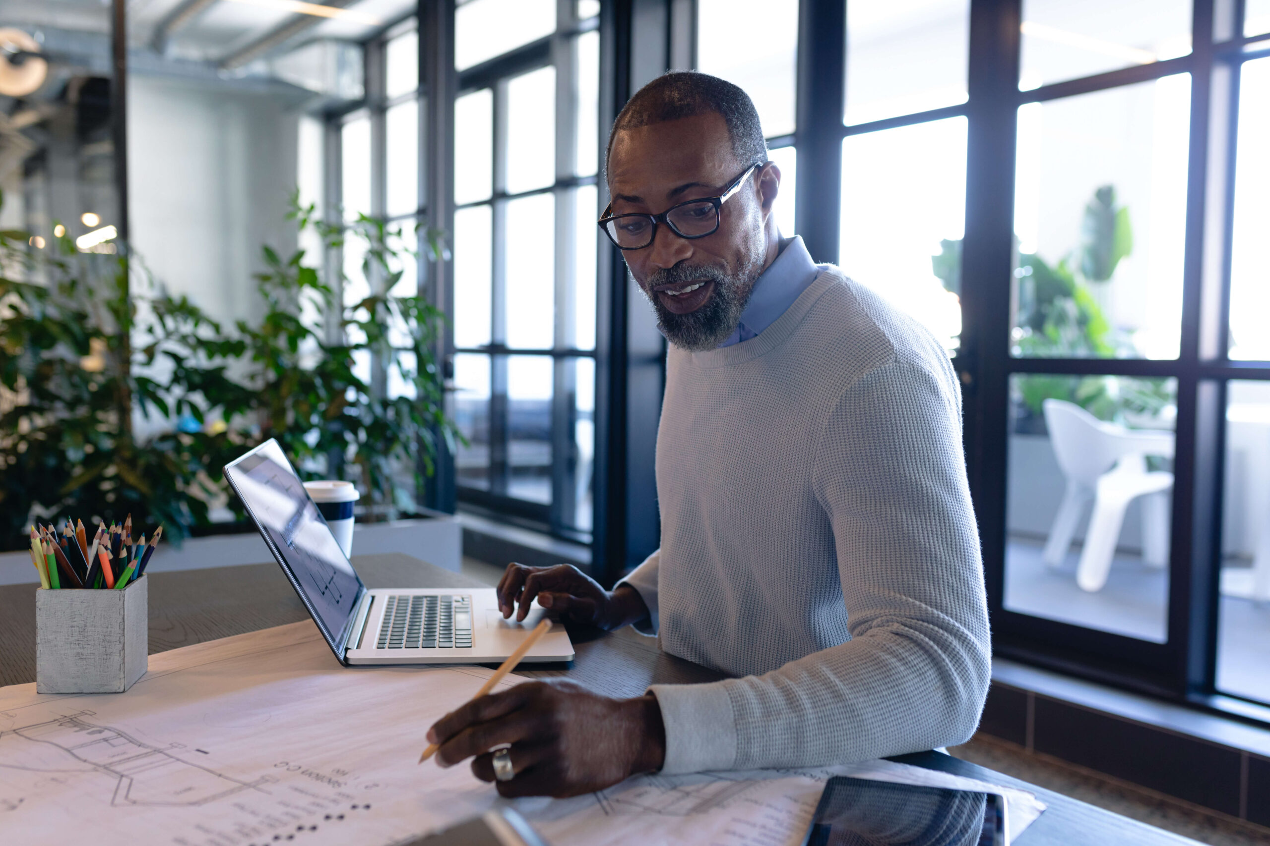 50+ professional man working at desk