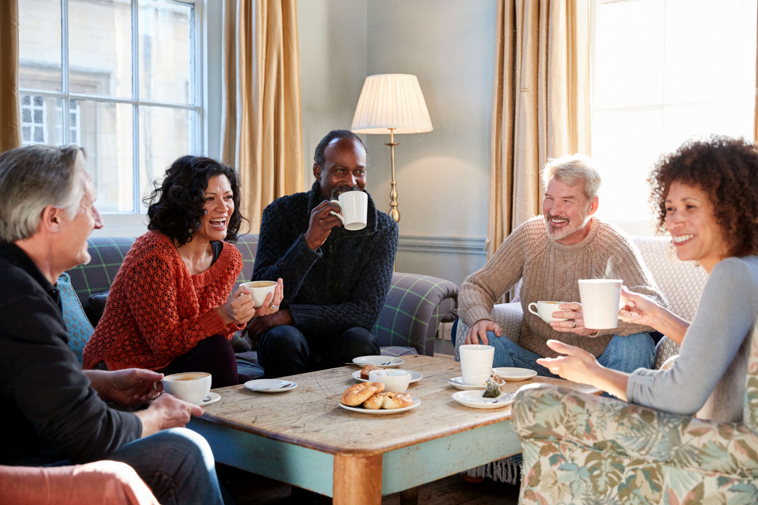 Mature couple coffee and croissant