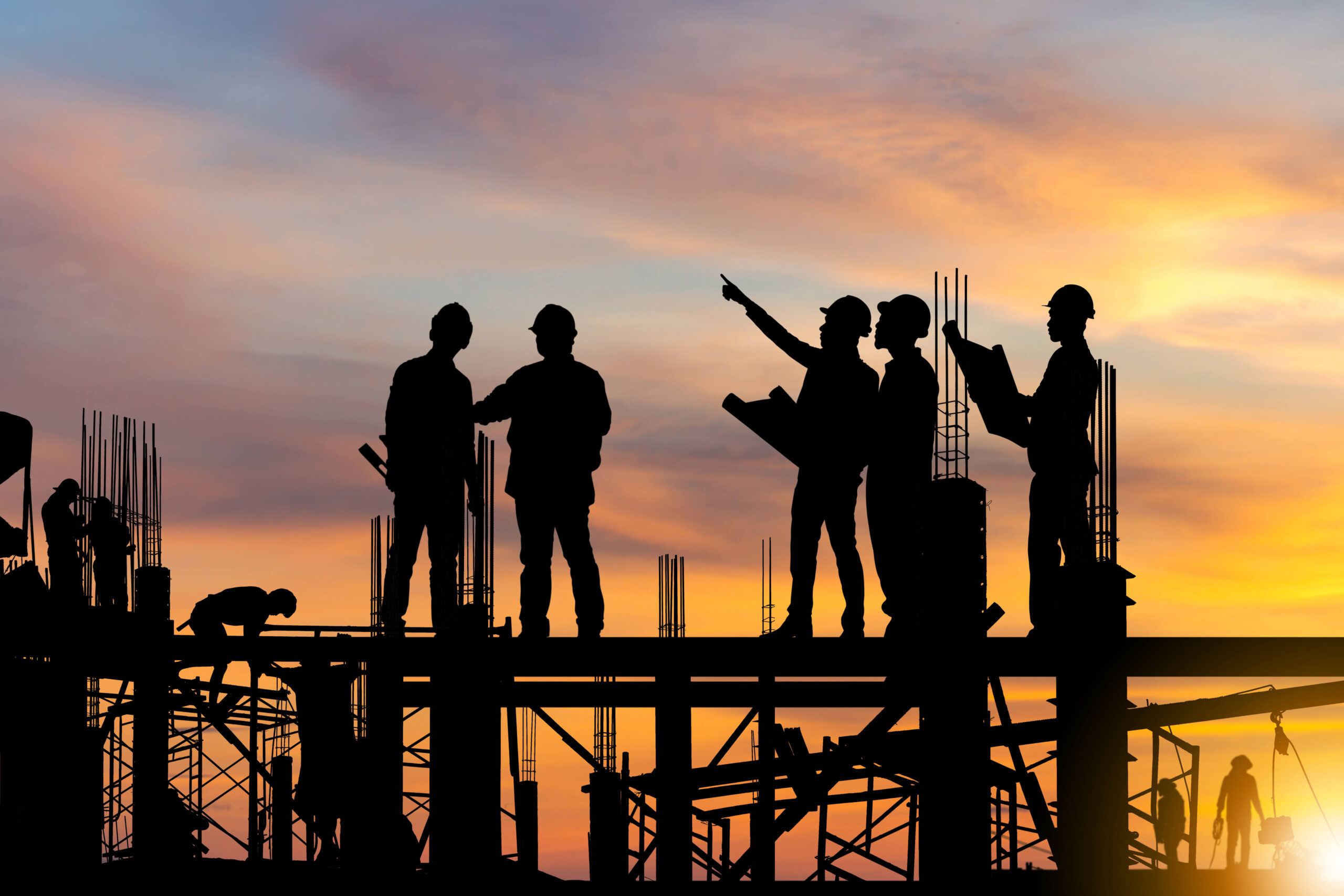 Men on scaffolding silhouette