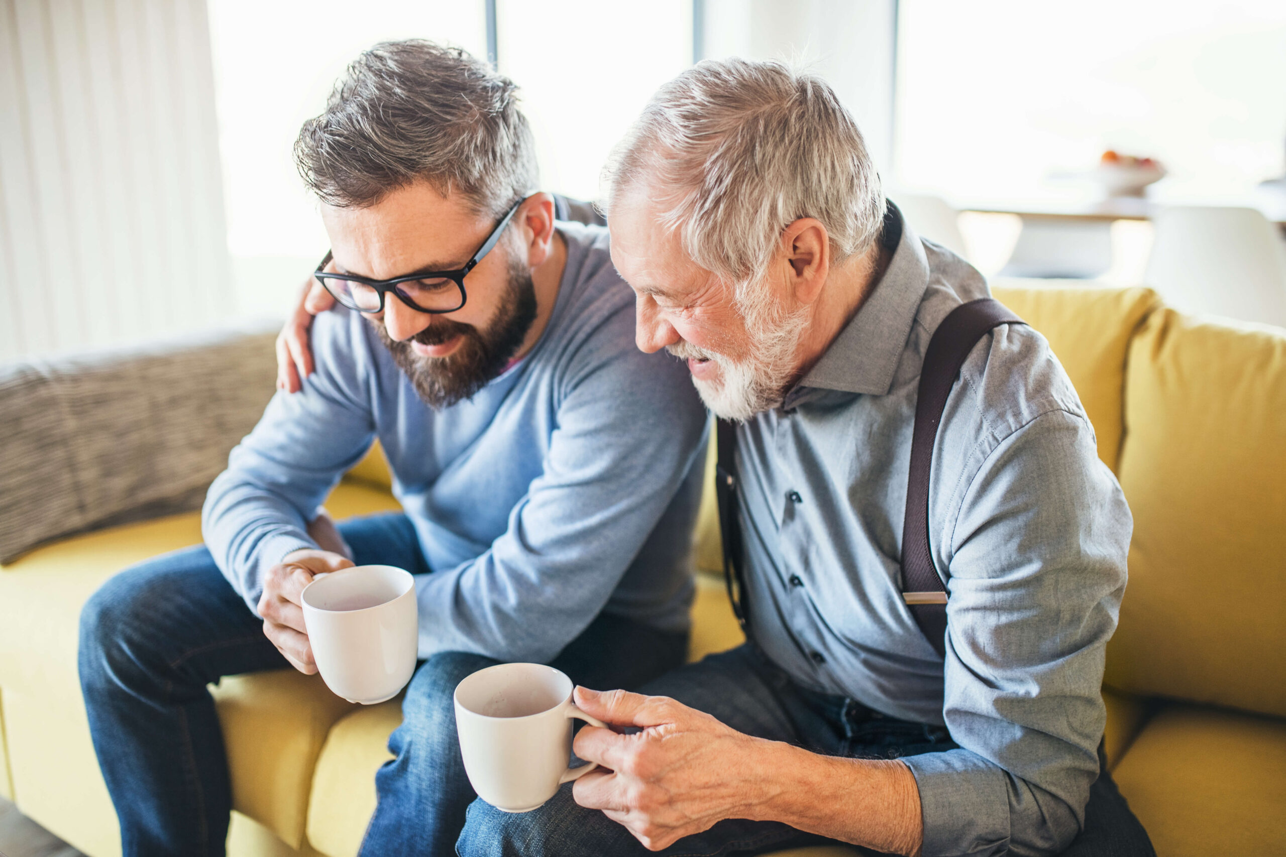 father and son with tea