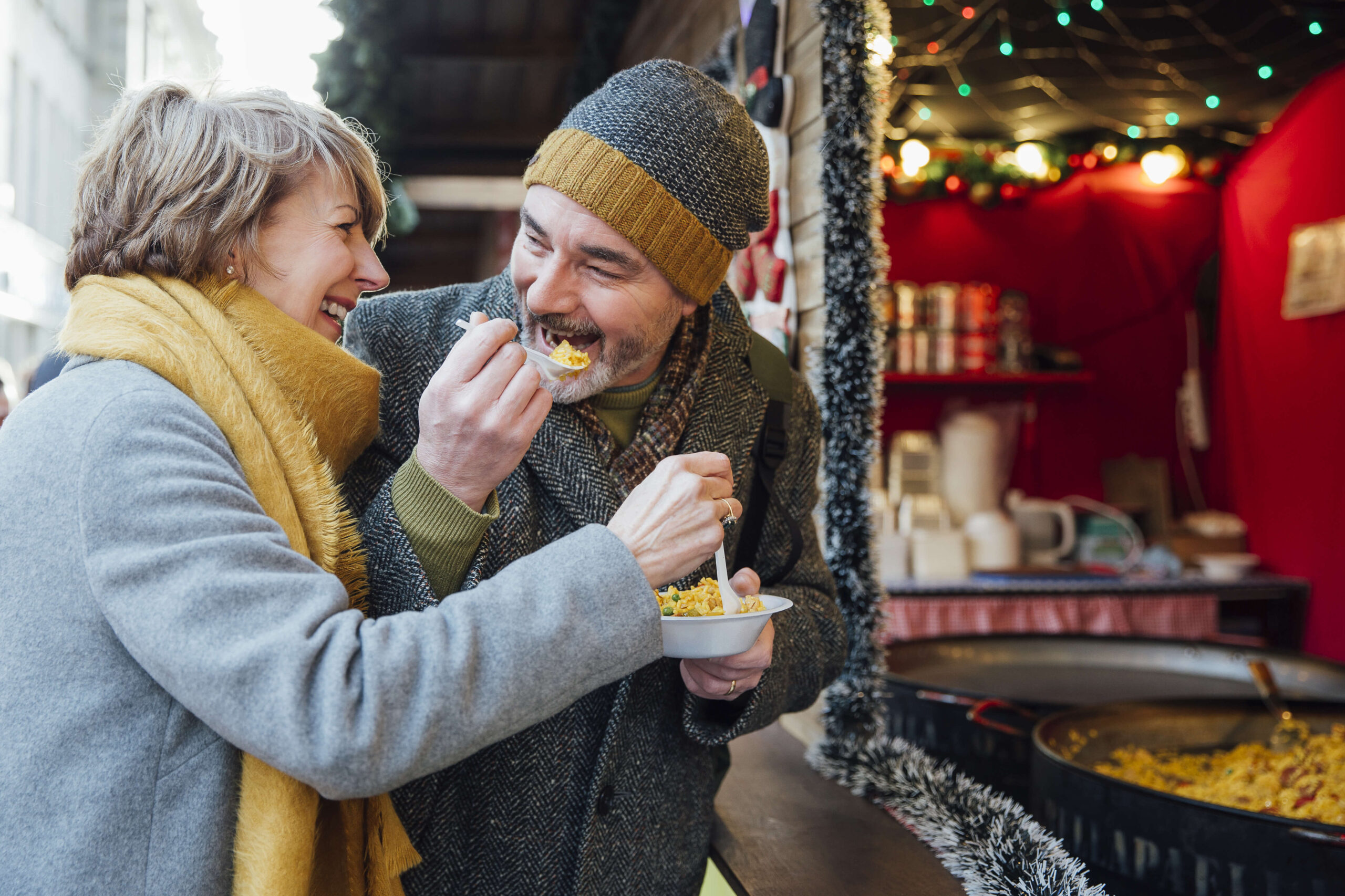 mature couple Christmas market