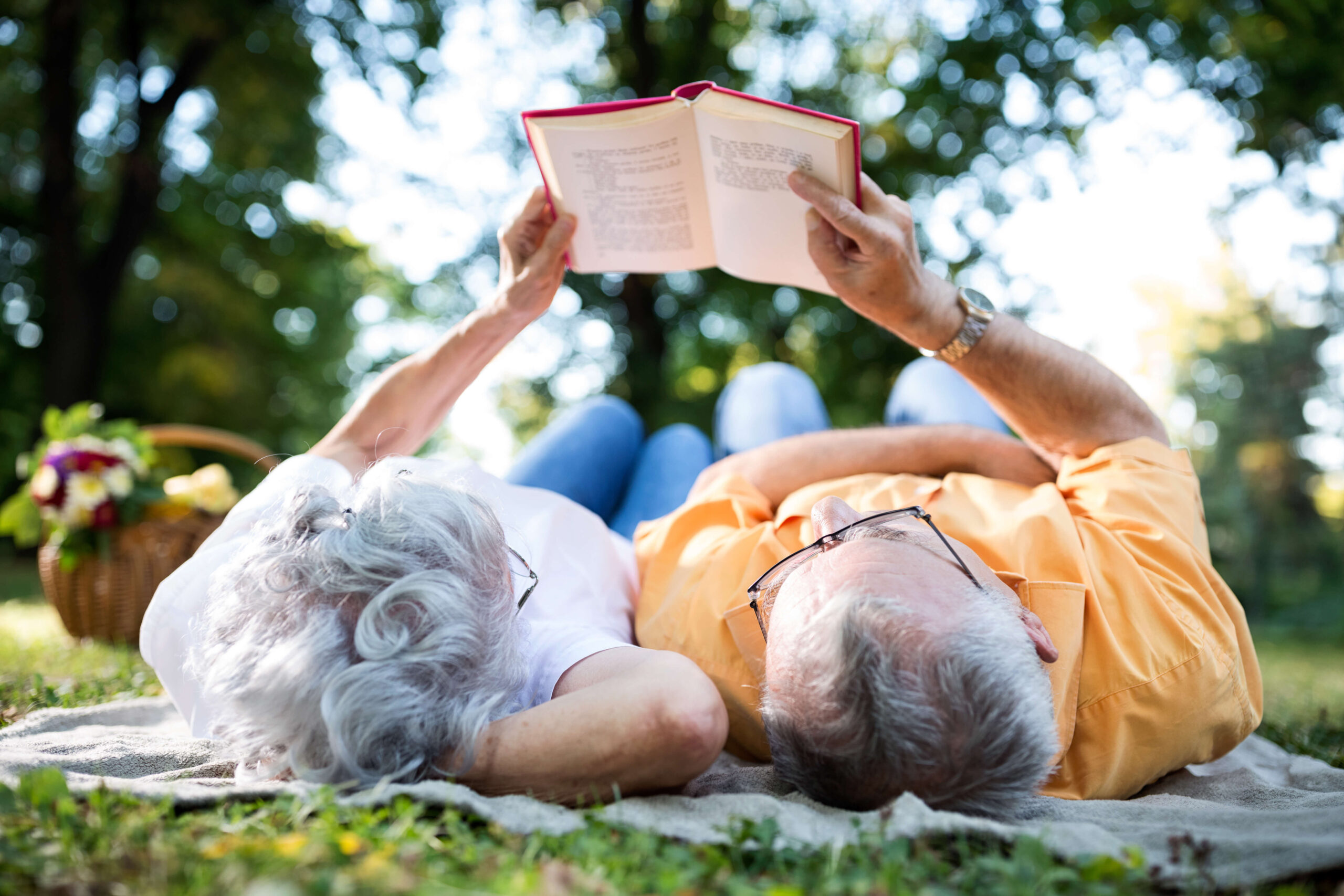 mature couple reading book