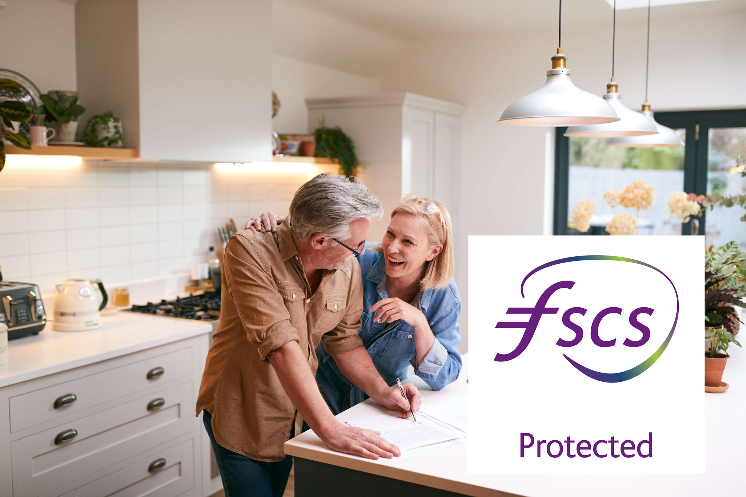 Couple talking in kitchen with FSCS logo overlay