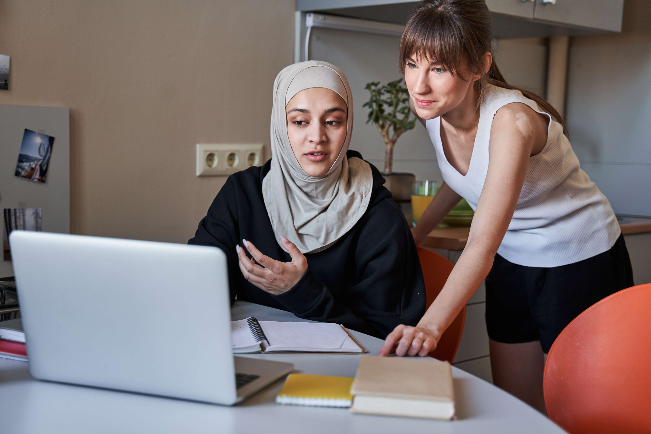 Professional women looking at laptop