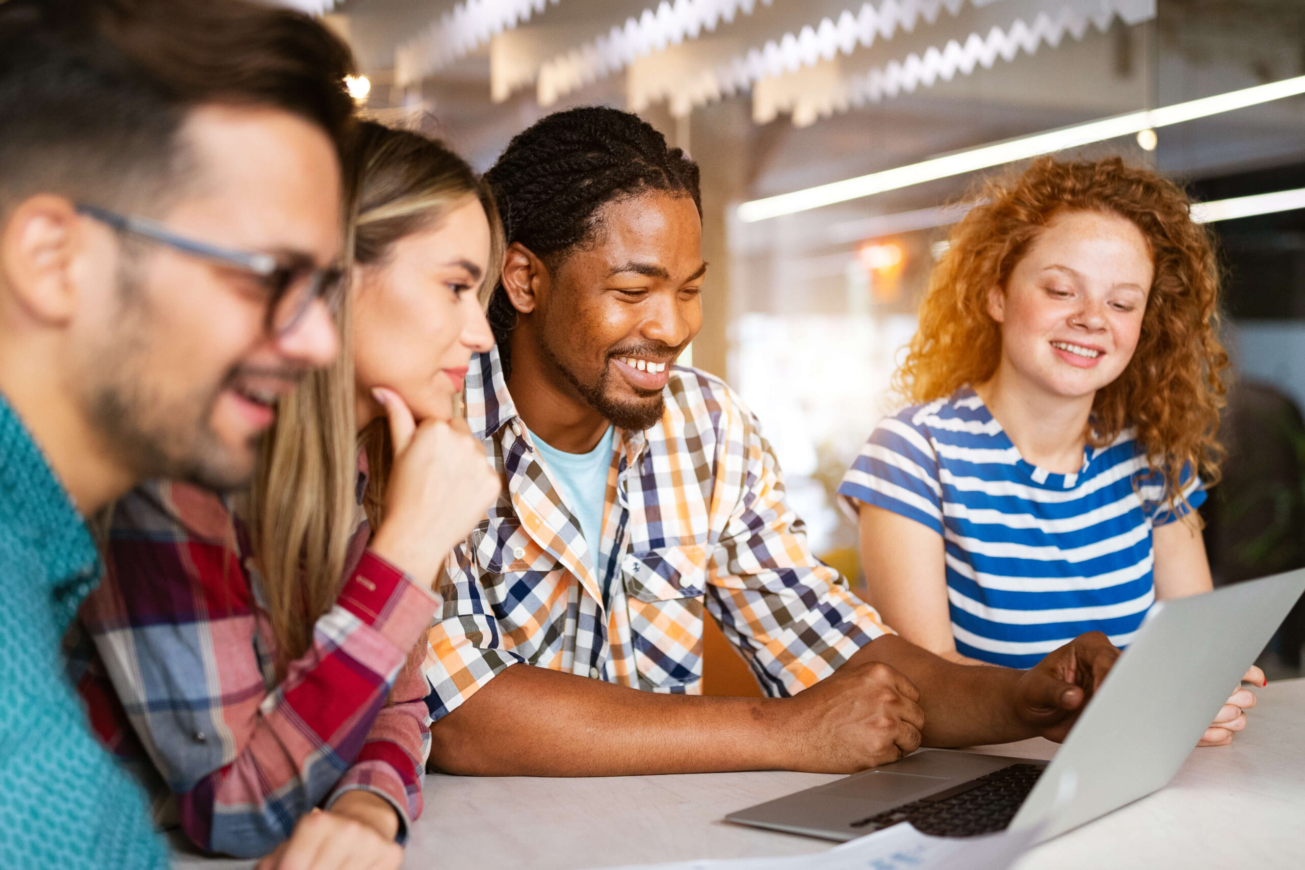 Young group at laptop