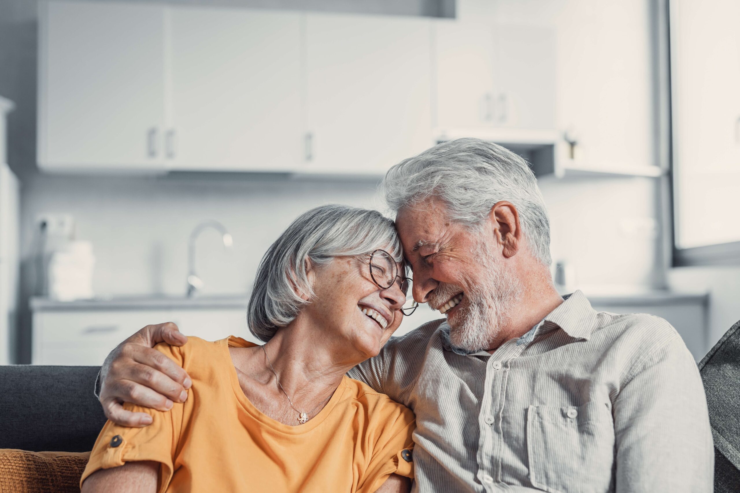 Mature couple laughing together