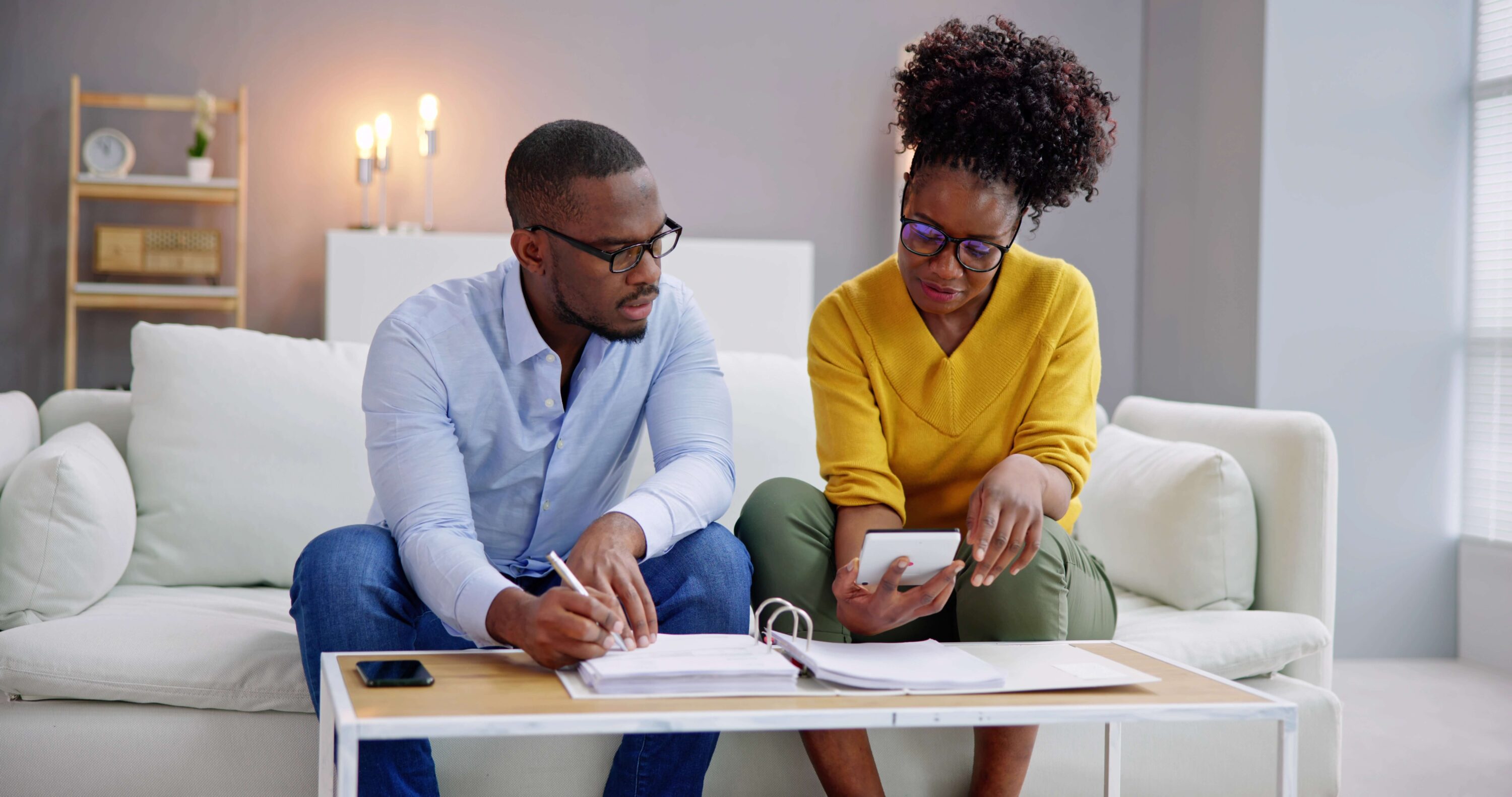 Young couple looking at bills