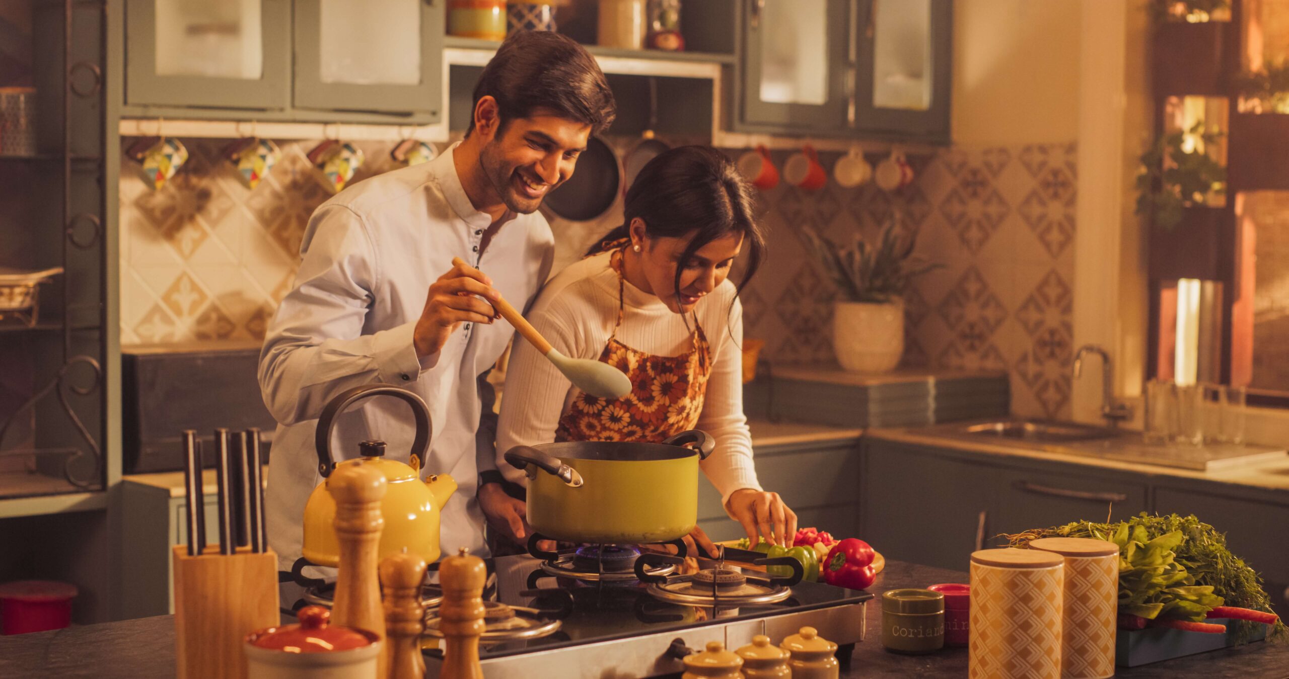 Couple cooking at home
