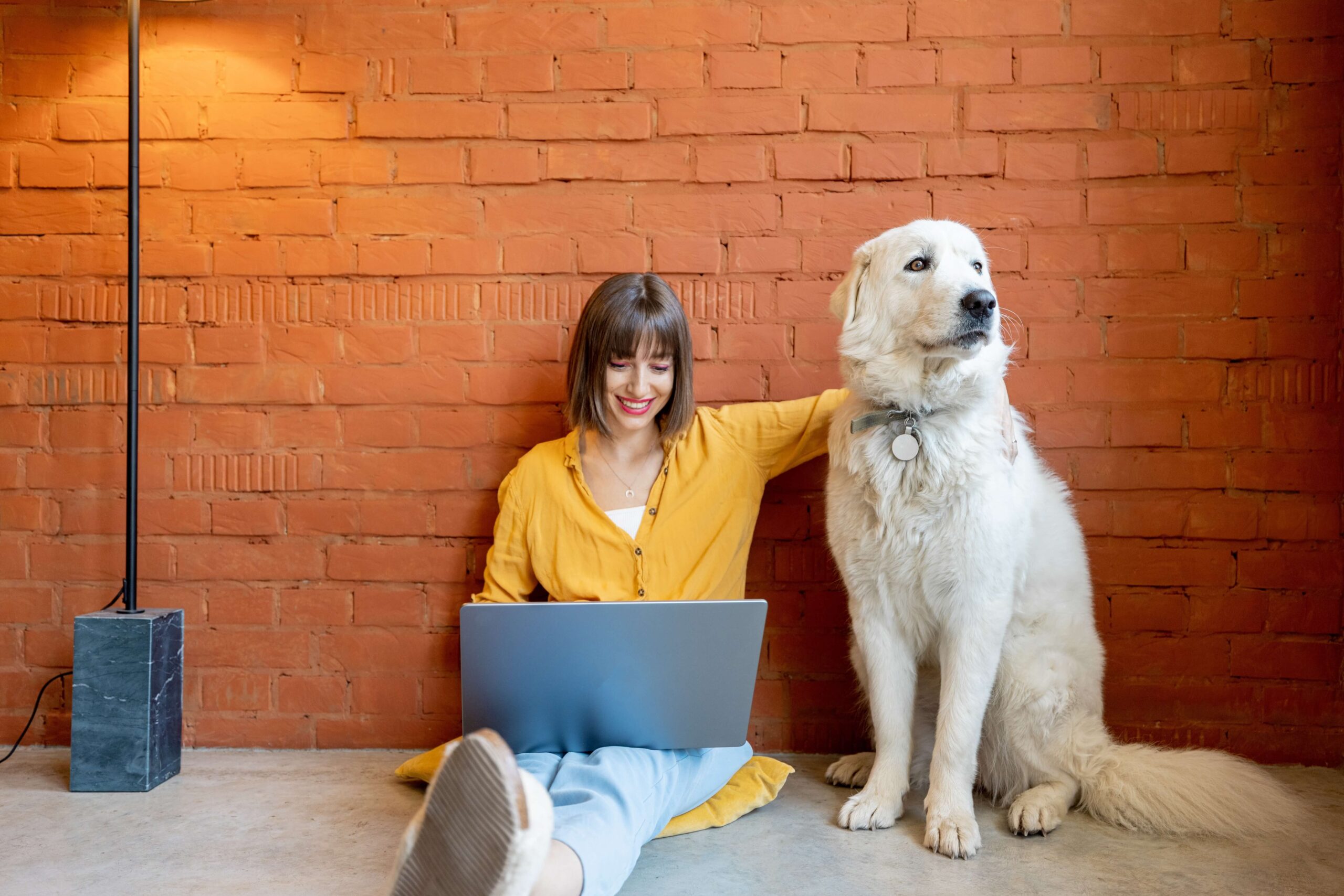 woman with dog at home