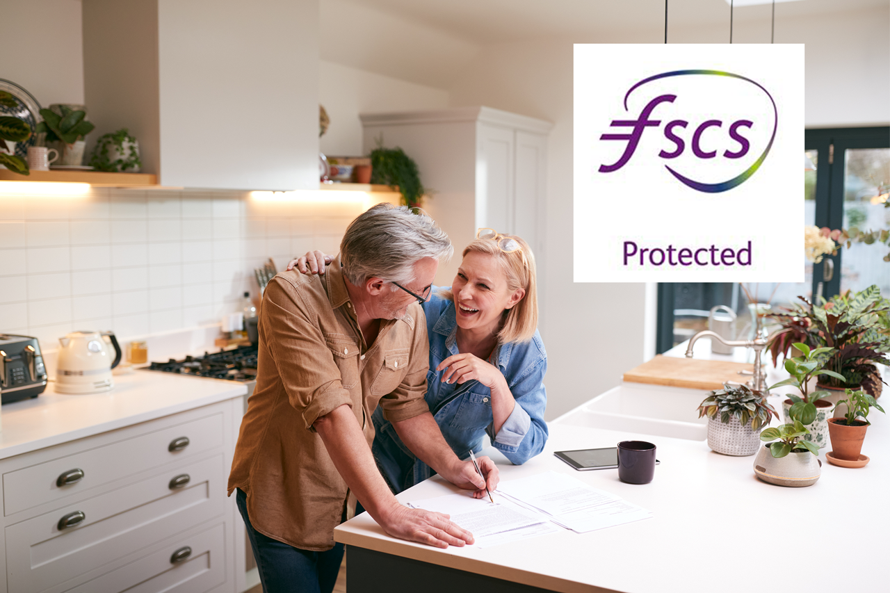 Couple talking in kitchen with FSCS logo overlay