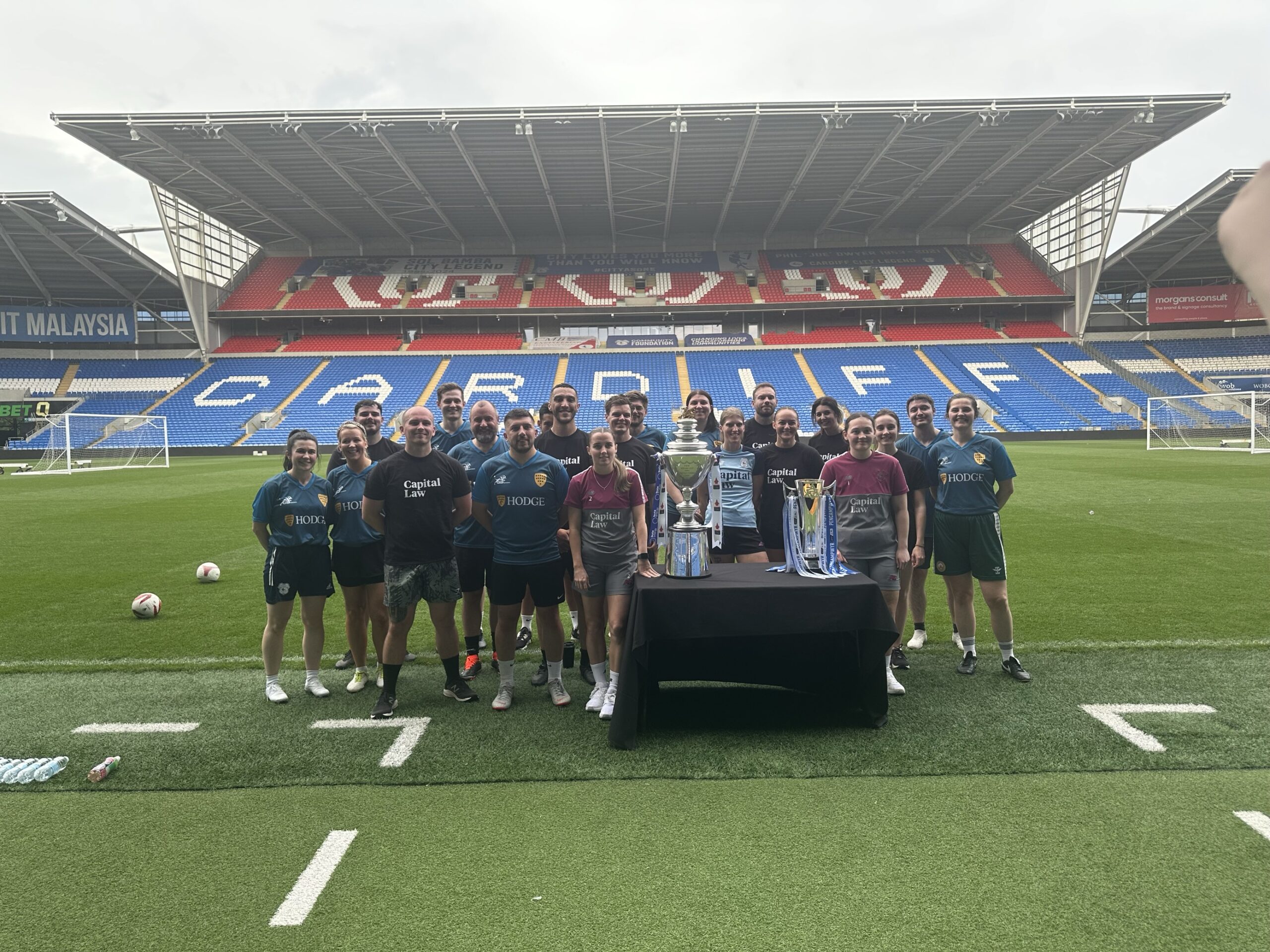 Group of people at Cardiff City's football stadium
