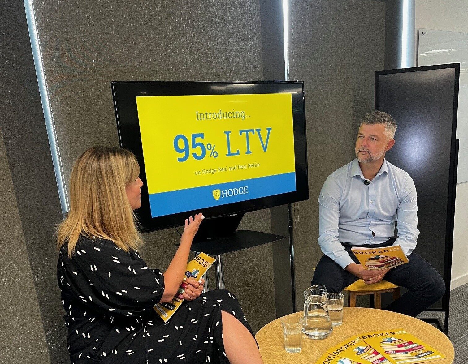 James Enos and Emma Graham sat talking