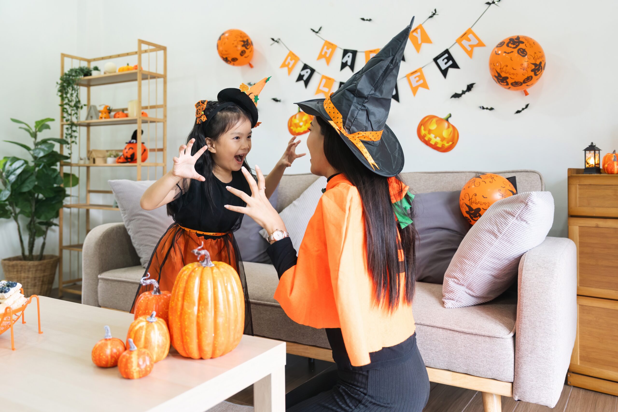 Happy,Family,Mother,And,Child,Happy,Girl,With,Halloween,At